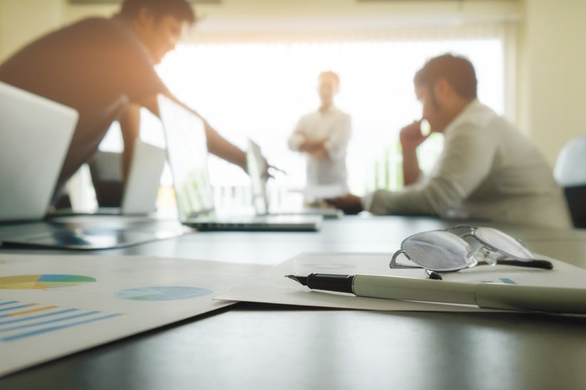 business-concept-with-copy-space-office-desk-table-with-pen-focus-analysis-chart-computer-notebook-cup-coffee-desk-vintage-tone-retro-filter-selective-focus
